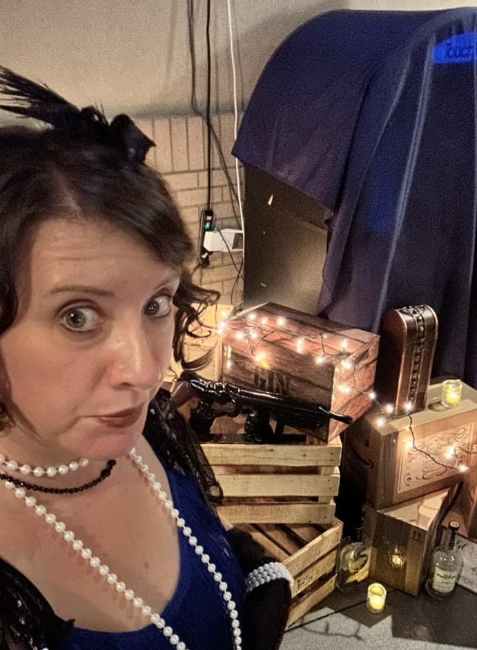 Annette in a 1920s flapper-style dress and headpiece